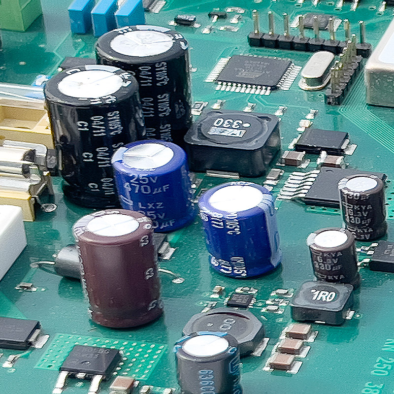 Various types of capacitor components on the PCB assembly board